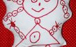 Dibujo de un niño en un peluche bordado de vuelta