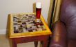 Mesa con mosaico de azulejos con incrustaciones de tapa de cristal