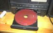 Metiendo un CD en un reproductor de CD