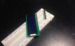 La soldadura de pernos de encabezado a un LCD 1602A con un protoboard