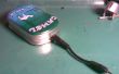 SNUS-cargador