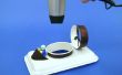 Modelos de vuelos y controlados de aerodeslizadores de la taza de café de papel