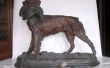 Cómo reparar una escultura de un perro y un faisán