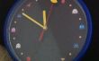 Reloj análogo con temas de Pac-Man