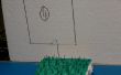 Gol de campo de fútbol miniatura, fútbol y pasto (hecha de alambre)