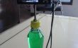 Como hacer soporte de cámara digital o trípode de botella