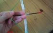 Cómo hacer una pluma de arco y flecha