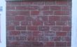 Falsa pared de ladrillo expuesto con cemento para colorear