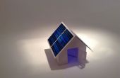 Casa de papel pop-up con energía solar