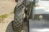 Reparar una rueda cortadora de césped doblado o roto