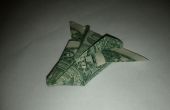 Dólar avión oragami