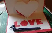 Hacer una tarjeta Pop Up que tiene una imagen de un corazón y la palabra amor