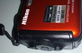 Nikon AW120 batería puerta reparación