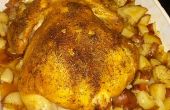 Horno pollo entero al horno con patatas de rojo