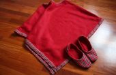 Poncho rojo y zapatillas para el invierno cómodo alrededor de la casa. 