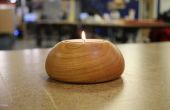 Sostenedor de vela de luz de té en un torno de madera