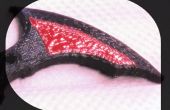 Pintura el Batarang 3D impreso con pintura de esmalte rojo