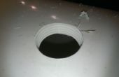 Cómo aprovechar un gran agujero en un tubo grande de PVC