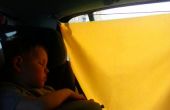 El sol persianas para el niño en el coche