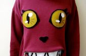 Suéter con cremallera de la boca del gato