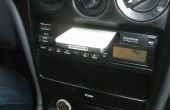 Literalmente: Acopla el Ipod a su ranura del cassette de audio de coche
