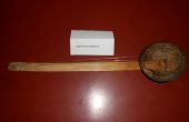 Simple cáscara de música instrumento usando coco y vara de bambú