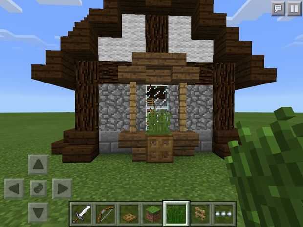 Minecraft pe pequeña casa Medieval / Paso 6: Decoración exterior 